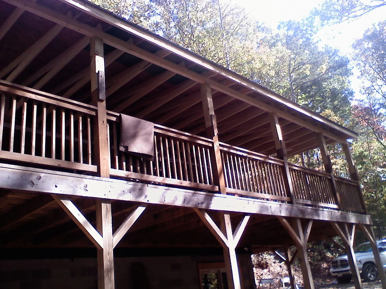 Timber framing under a new elevated porch and deck — Roof Leak Repair in Udell by Roofing Brothers